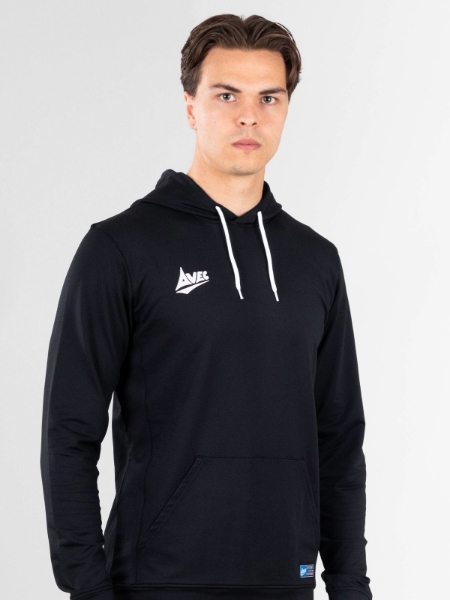 A man is wearing a plain black hoody which is designed to go over the head.