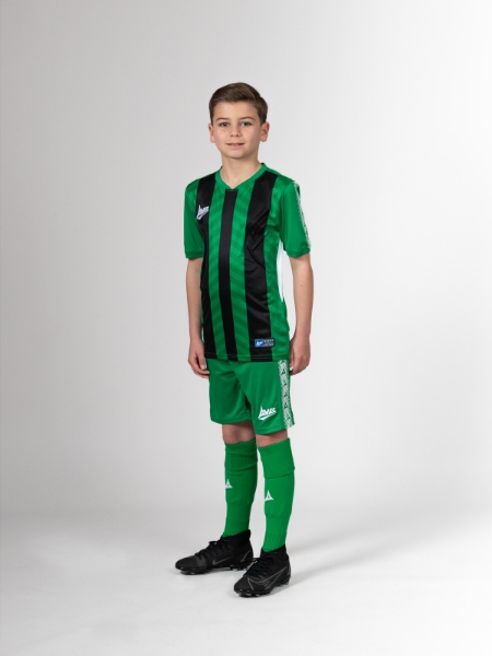 Green and black football shirt is worn with green football shorts and green socks