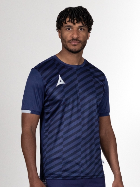 There is a man wearing a two-tone navy blue t-shirt