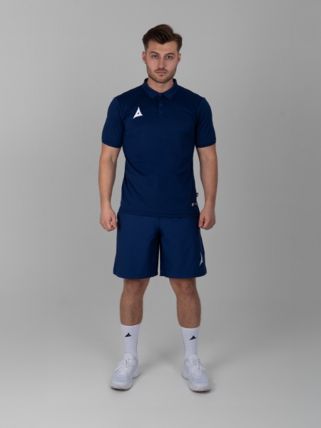 A man is wearing a smart navy polo shirt