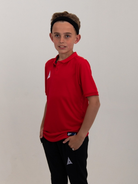 A children's red polo shirt