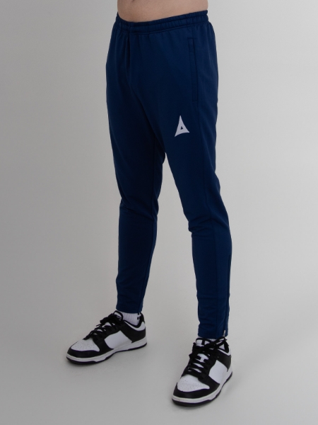 Navy Blue slim fit tracksuit bottoms for football are being worn