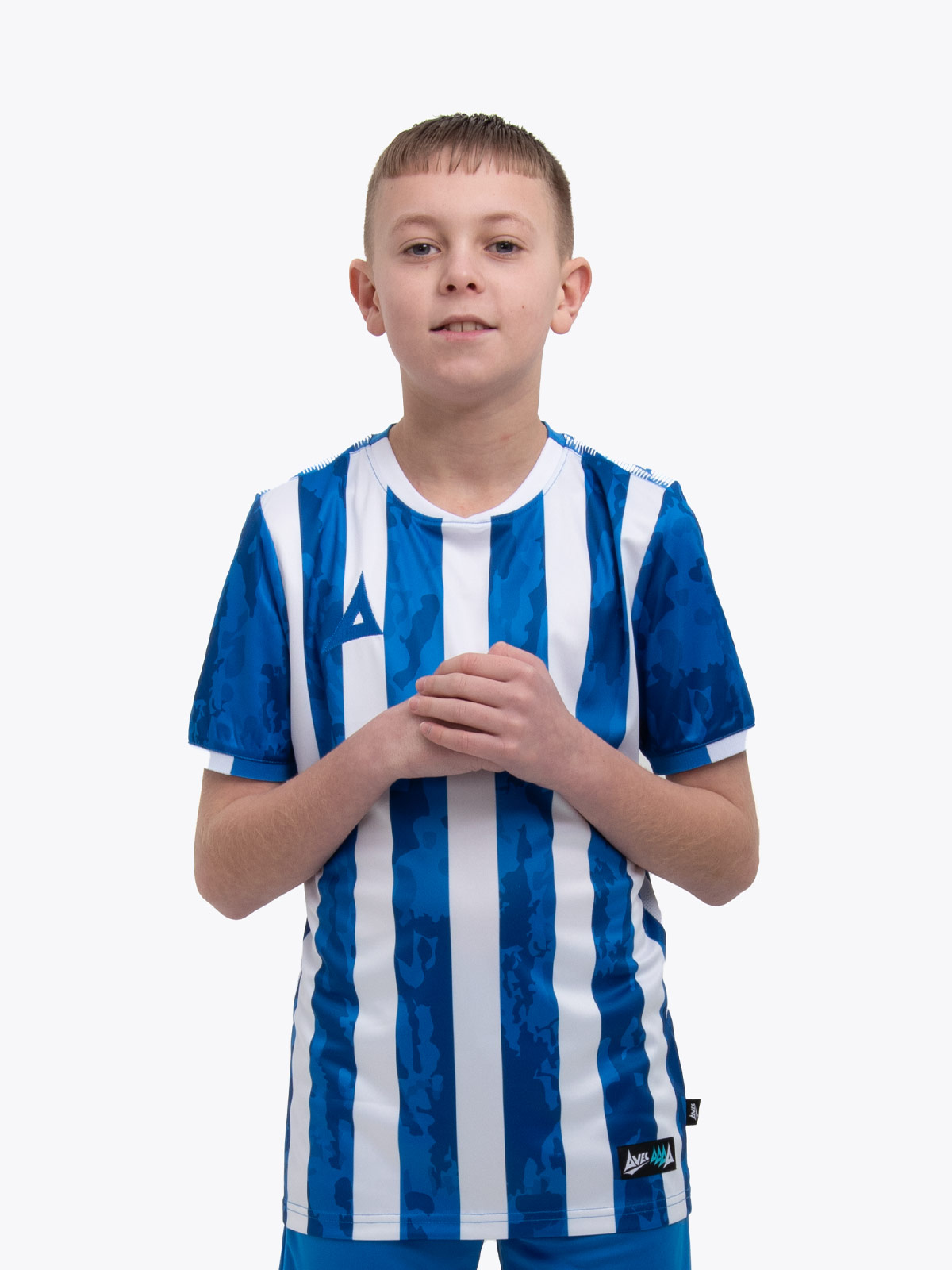 a young child is wearing a royal blue and white stripe football shirt with a camo pattern.