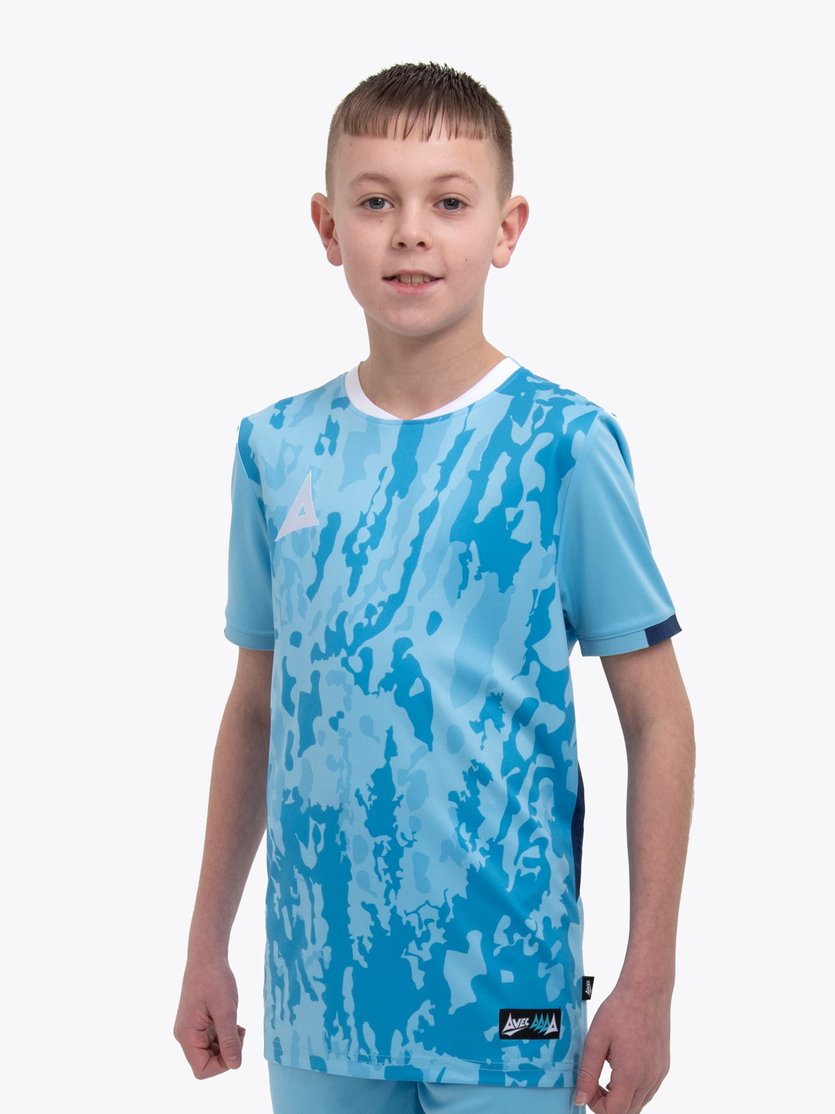 a young child is wearing a sky and navy football shirt. the football shirt has a camo pattern