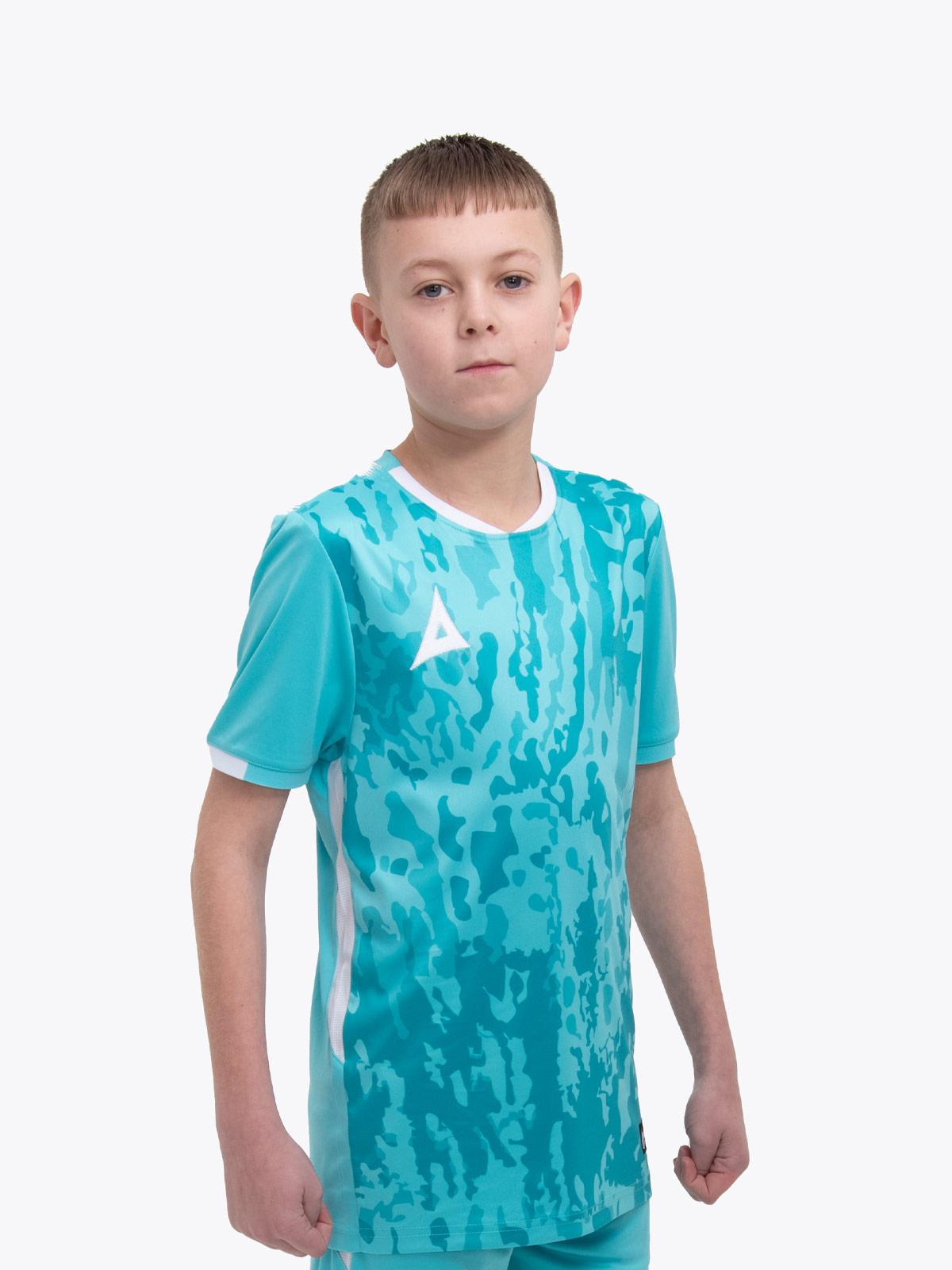 a kid standing up wearing a hyper blue football shirt