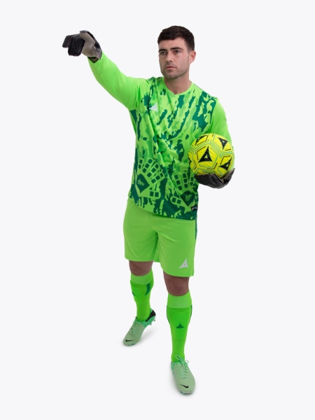 A model standing up wearing a neon green goalkeeper football shirt, neon green Shorts and neon green Football Socks.