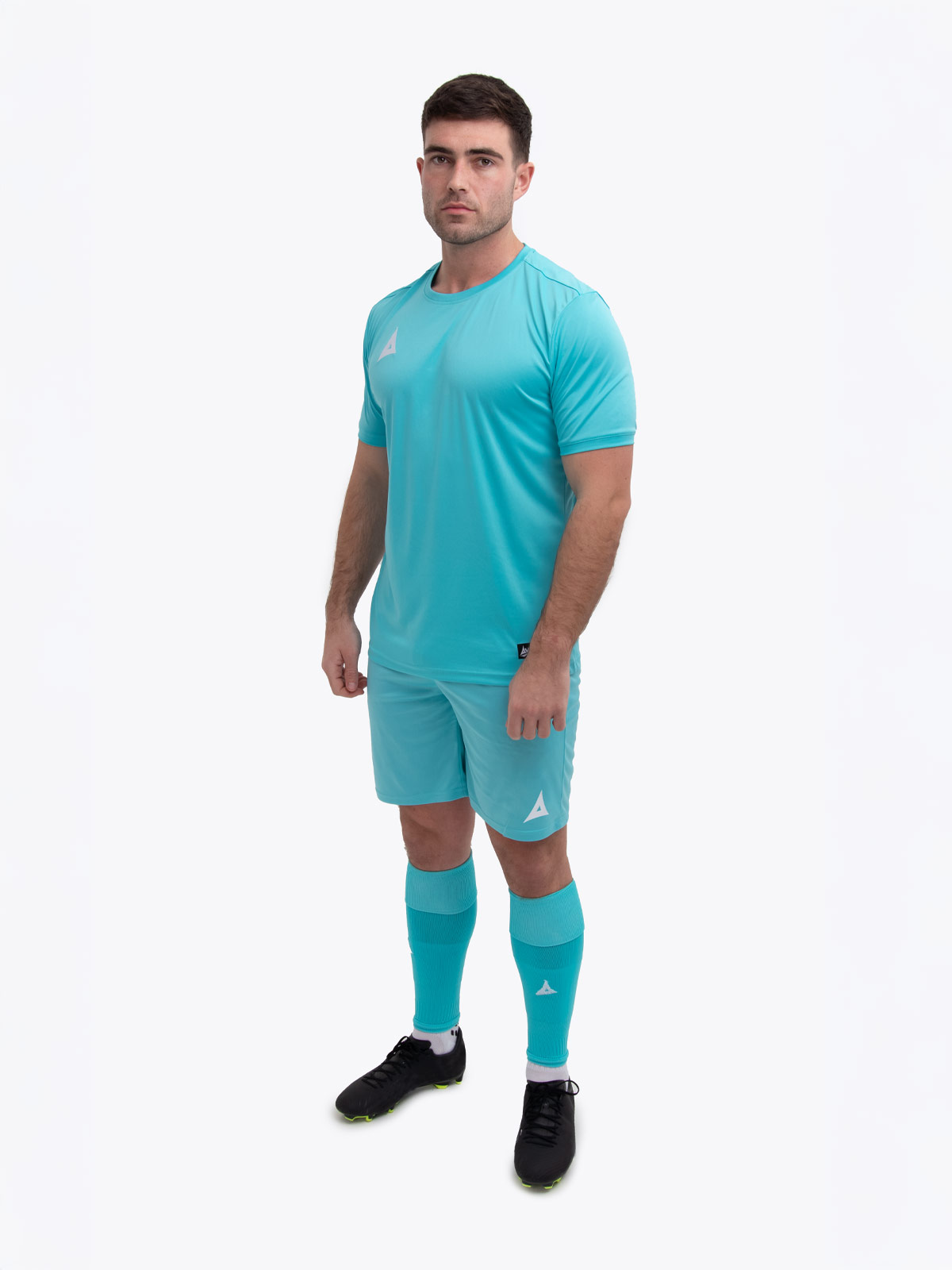 a model is wearing a hyper blue football kit