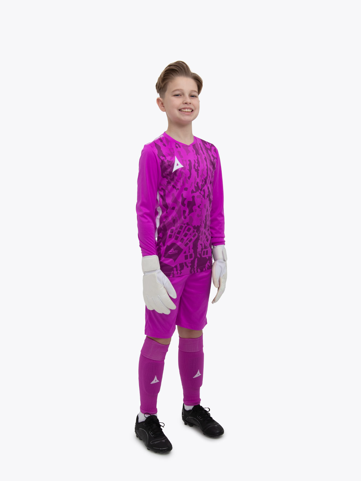 a kid is wearing a full magenta goalkeeper football kit